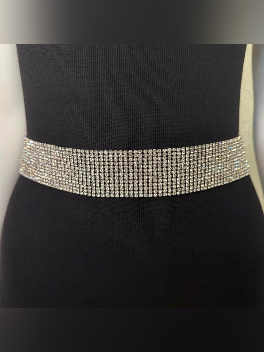 Silver tone metal chain belt with rhinestones